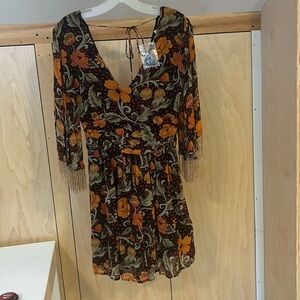 Verb by Pallavi  Singhee Vibrant floral dress with beaded sleeves. 100% viscose